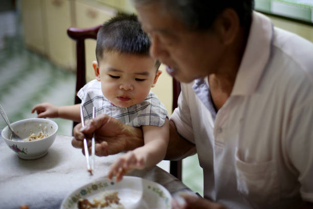 Asian Toddler - Meal Time stock photo