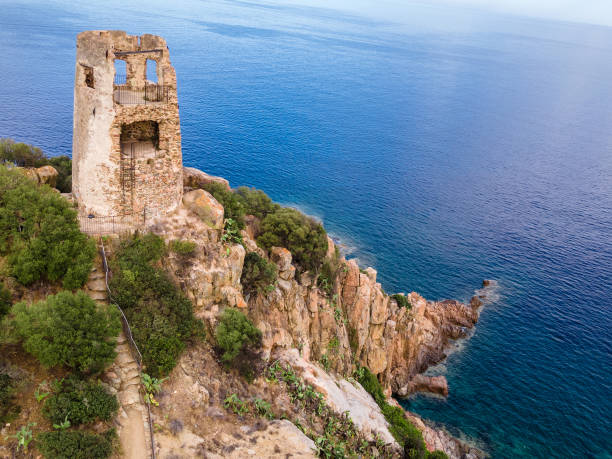 istock San Gemiliano tower on the rocky coast. 1340732694