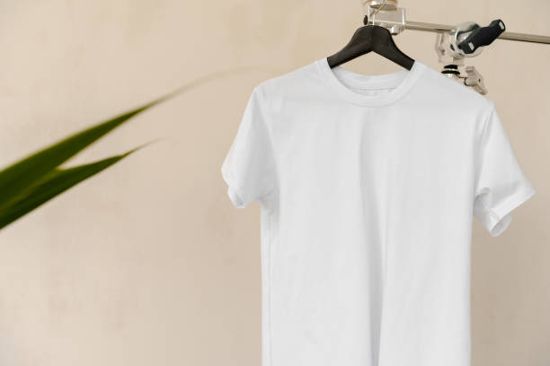 istock Plain white cotton t-shirt on hanger for your design 1340733743