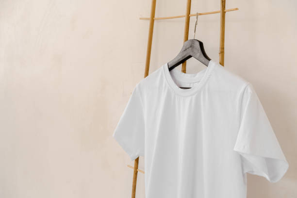 istock Plain white cotton t-shirt on hanger for your design 1340733861