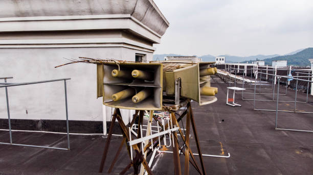 Speakers of the civil defence alarm on the roof stock photo