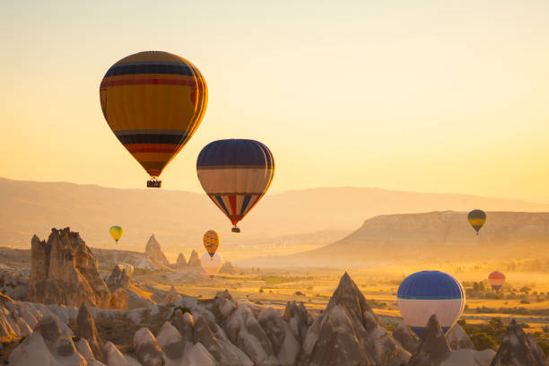 istock Hot air balloons flying over Cappadocia, Turkey 1340738419