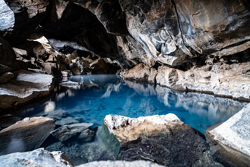 Grjótagjá is a small lava cave near lake Mývatn in Iceland. It has a thermal spring inside. In early 18th century the outlaw Jón Markússon lived there and used the cave for bathing. Until the 1970s Grjótagjá was a popular bathing site.