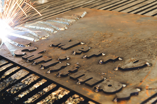 Metal welding specialist. Engineering welder working in metal factory.