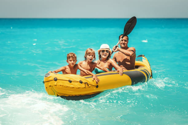 6,900+ Family Beach Boat Stock Photos, Pictures & Royalty-Free Images ...