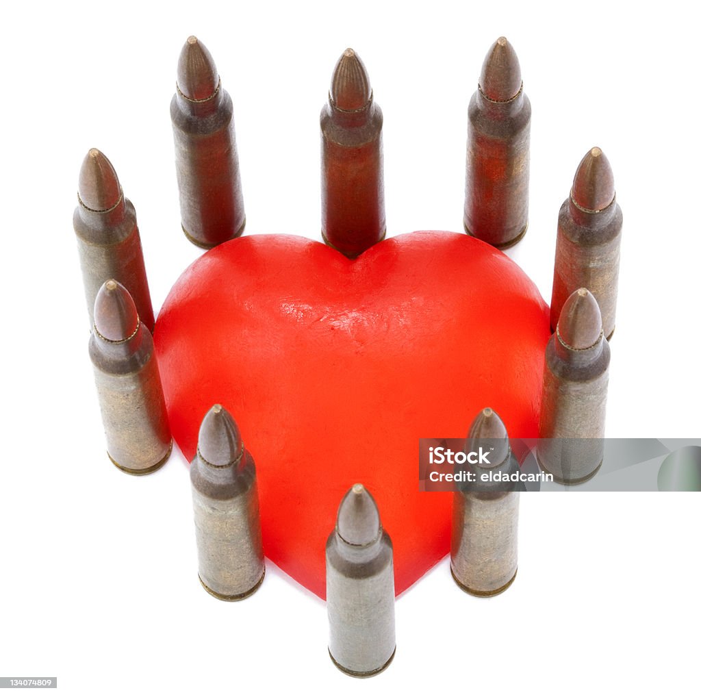 Protected Heart A heart shaped bar of soap completely surrounded by 5.56 cartridges. Shot from a high anlge. Isolated on white background. Affectionate Stock Photo
