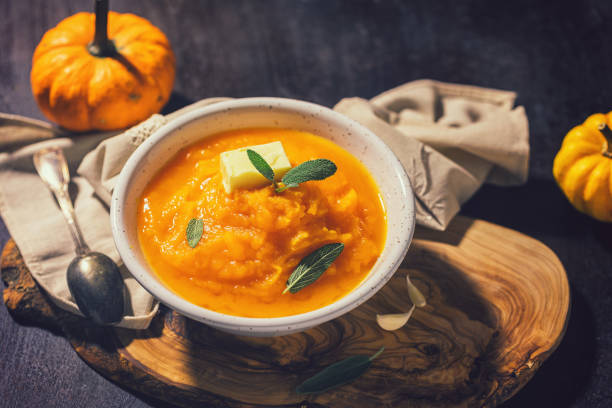 istock Homemade pumpkin cream soup with sage 1340750094