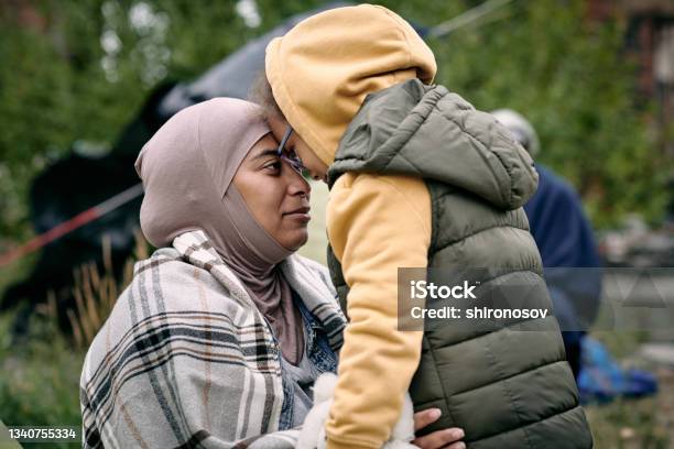 Family Reunification After Escape Stock Photo - Download Image Now - Refugee, Refugee Camp, Family