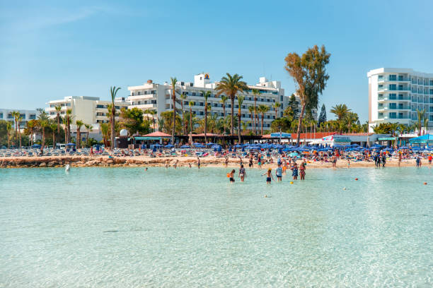 Ayia Napa, Cyprus- April 3, 2016: Famous blue flagged Nissi beach, view from little island.