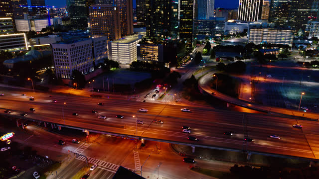 Downward Tilting Aerial Shot of Freeway in Dallas at Night