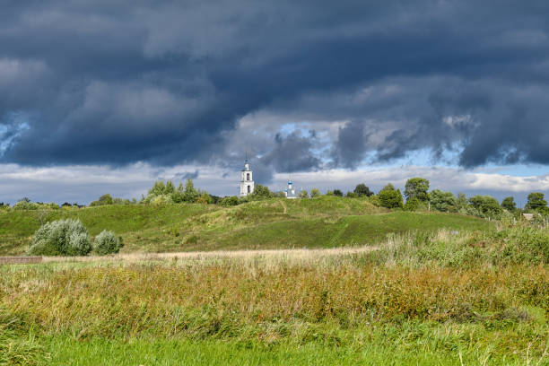 istock Eastern Orthodox Church on the hill. Heavy low clouds 1340760722