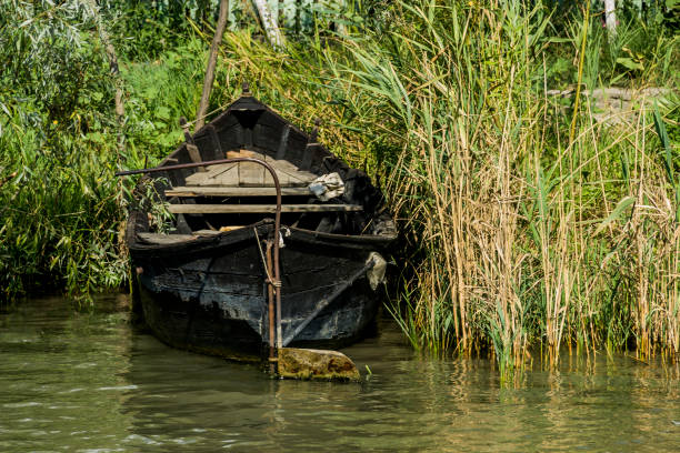 istock wooden boats in the river 1340760888