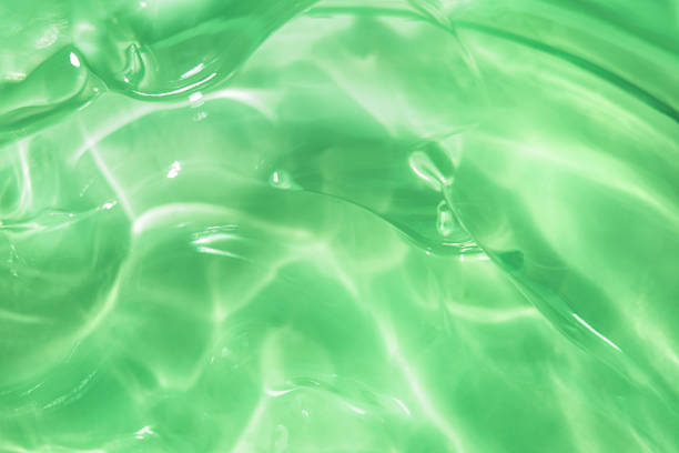 istock Green water Aloe Vera gel smudged texture 1340761013