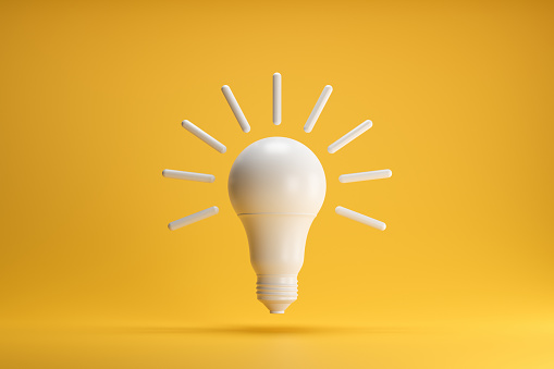 Light bulb concept idea innovation on yellow background. 3D rendering.
