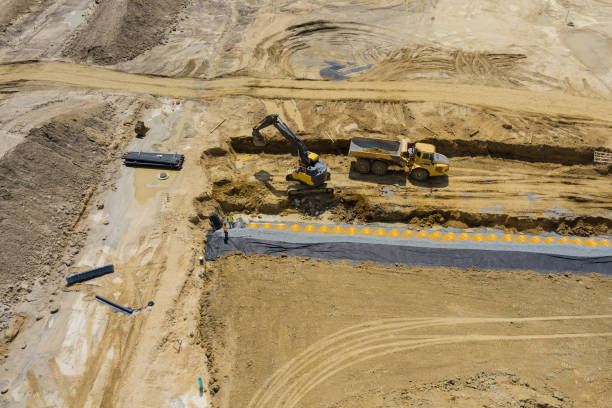 istock Panoramic view of work preparing ground under construction in laying drain stormwater system 1340762643