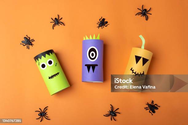 Halloween Diy And Kids Creativity Ecofriendly Reuse Recycle From Toilet Roll Tube Children Paper Craft Monster Pumpkin Development Imagination And Sensory Motor Skills Stock Photo - Download Image Now