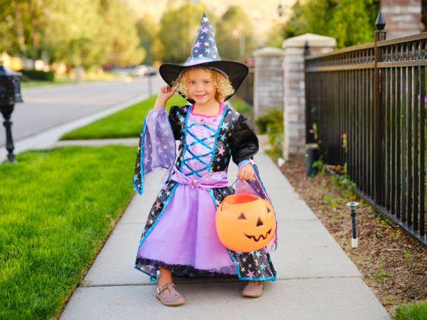 istock Children in Halloween Costume 1340774340