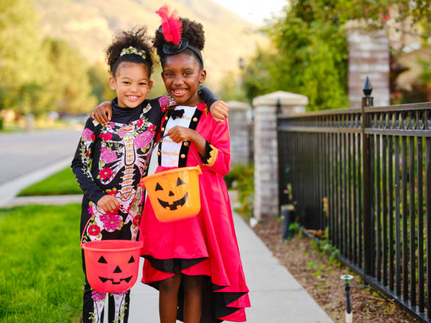 istock Children in Halloween Costume 1340774374