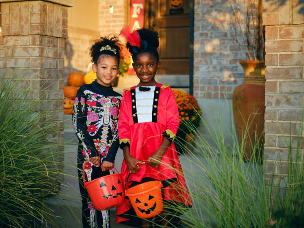 istock Children in Costume on Halloween Trick or Treating 1340774473