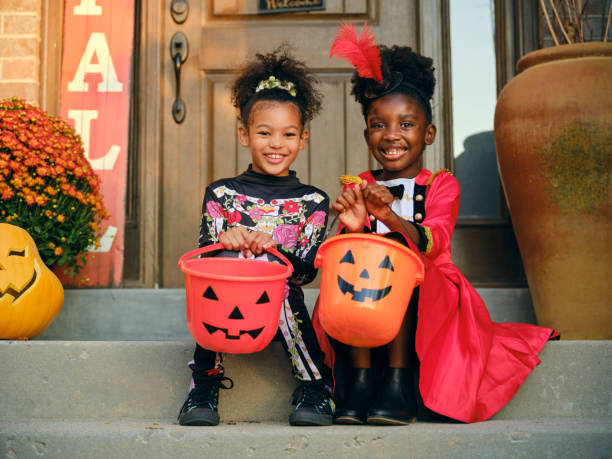 istock Children in Costume on Halloween Trick or Treating 1340774501