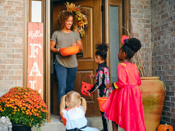 istock Children in Costume on Halloween Trick or Treating 1340774551