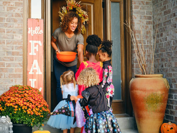 istock Children in Costume on Halloween Trick or Treating 1340775068