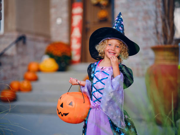 istock Children in Halloween Costume 1340775076