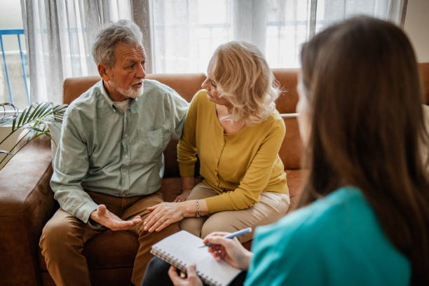 istock Senior couple solving their marriage problems with psychotherapist 1340775820