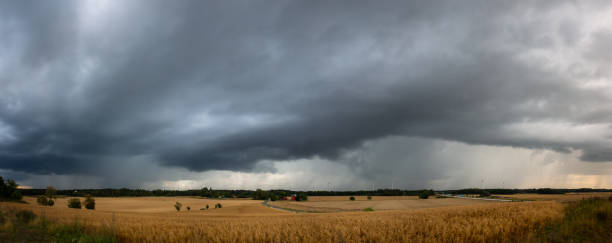 istock Panorama of a passing by thunderstorm 1340777057
