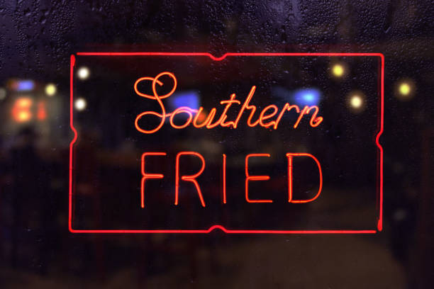 istock Southern Fried Chicken Neon Sign in Rainy Window 1340778121
