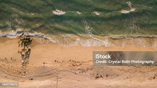 Aerial Drone Views Of Ocean Waves Sweeping Across The Palm Beach Florida Seashore At Sunrise In September Of 2021 Stock Photo - Download Image Now