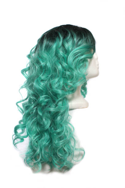 istock Black With Green Wig on Mannequin head with white background 1340778294