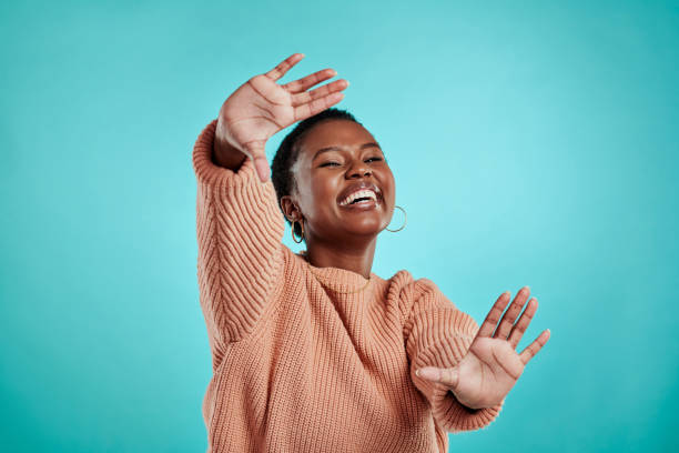 istock Studio shot of a young woman forming a frame with her hands 1340779164