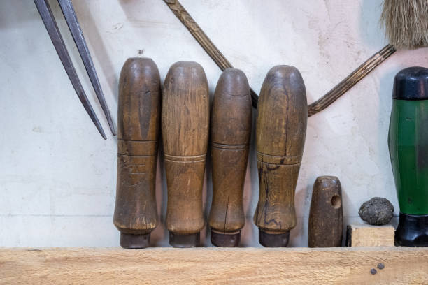 istock Wooden handles of a silverwork artist's tools. 1340782440