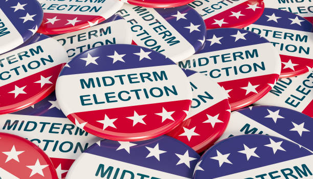 Close-up US midterm election badges with Stars and Stripes in blue and red. The text Midterm Election in the center. US election campaign button, 3D Render midterm election stock pictures, royalty-free photos & images