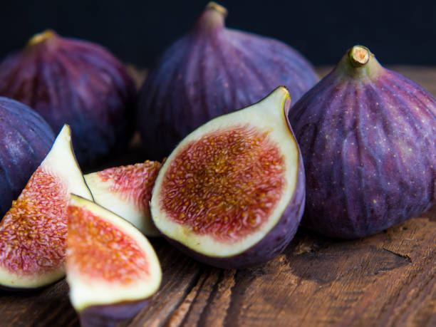 istock Still life with fresh figs on an old table 1340786194