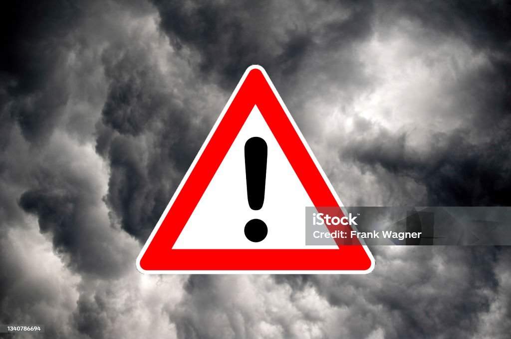 Attention! A warning sign of dramatic rain clouds Alertness Stock Photo