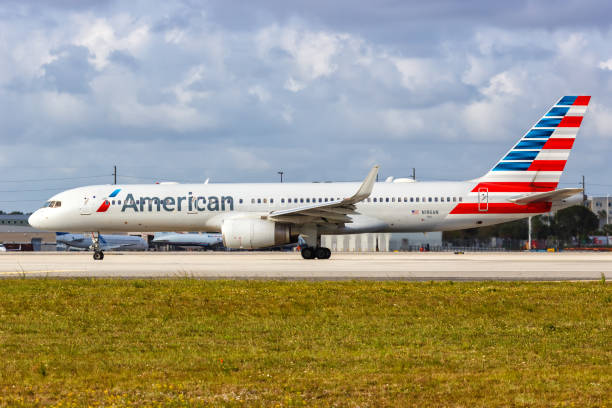American Airlines Boeing 757-200 airplane Miami airport in Florida Miami, Florida - April 6, 2019: American Airlines Boeing 757-200 airplane at Miami airport (MIA) in Florida. Boeing is an American aircraft manufacturer headquartered in Chicago. boeing 757 stock pictures, royalty-free photos & images