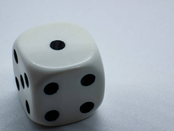 istock gambling white dice with number one on one side 1340792166
