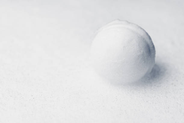 istock one snowball on white background, close-up view 1340792401