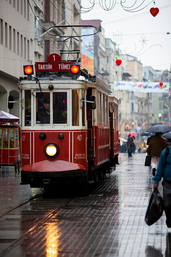ıstanbul, Turkey - 06 April, 2009: Red retro tram travelling on Istiklal street, Beyoglu - Istanbul.