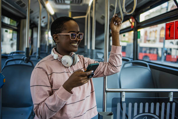 istock Young woman using public transportation 1340792558