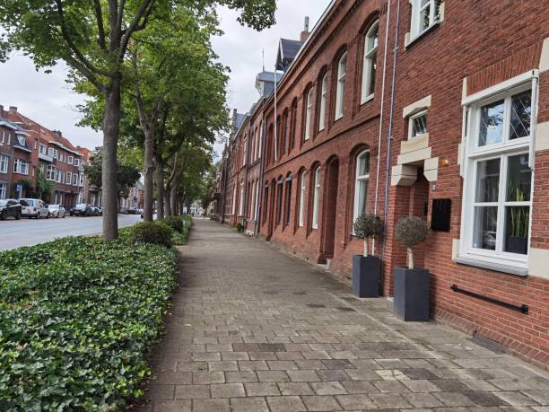 istock Typical street facade in Netherlands with brick houses 1340795523