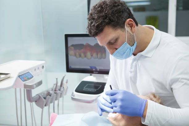 istock Woman getting dental treatment 1340796805