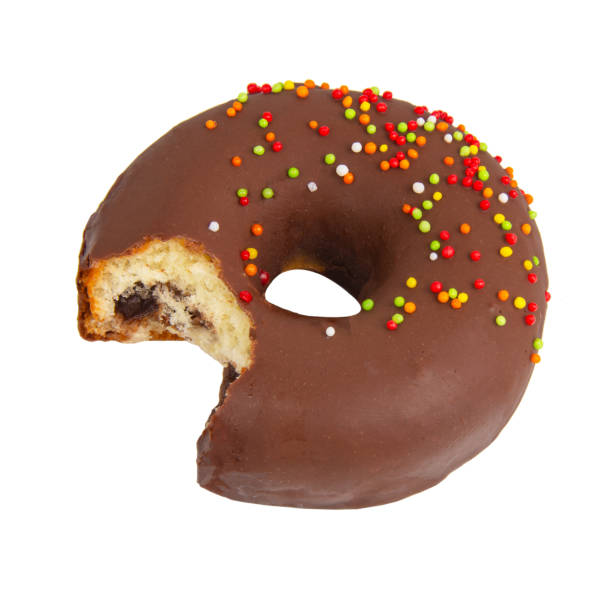 istock Chocolate glazed donut eaten decorated isolated on the white background 1340798981
