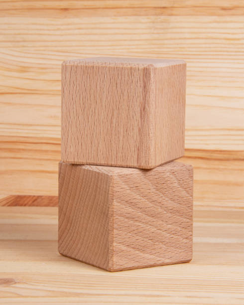 istock Bright wooden cube square on wood vintage background copyspace 1340804729