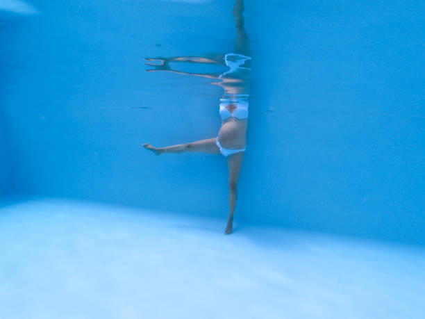 istock Pregnancy Exercise in Swimming Pool 1340805995