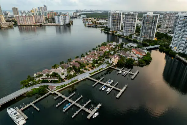 Aerial photo upscale residential homes on an island with dock