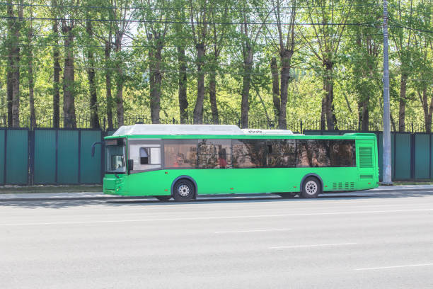 istock City bus at a stop on street 1340808657