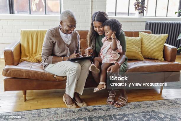 Multigeneration Family Bonding At Home Stock Photo - Download Image Now - Multi-Generation Family, African-American Ethnicity, Family
